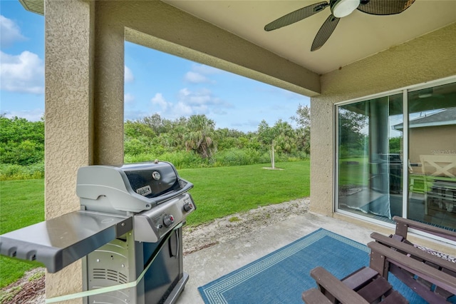 7164 Mikasa Dr, Punta Gorda, FL 33950 - view of patio with grilling area and ceiling fan