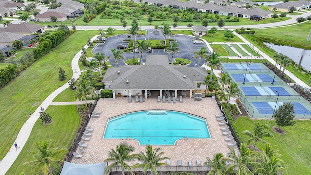 7164 Mikasa Dr, Punta Gorda, FL 33950 - aerial view of residential area featuring a pool and a large body of water