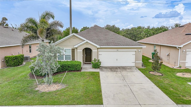 7164 Mikasa Dr, Punta Gorda, FL 33950 - view of front of property featuring stucco siding, driveway, an attached garage, a front yard, and a shingled roof