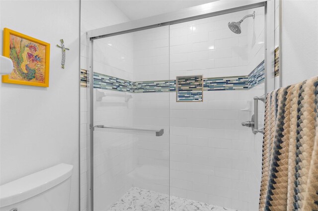 340 Three Lakes Ln Unit F, Venice, FL 34285 - bathroom with toilet and a shower stall