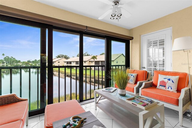 340 Three Lakes Ln Unit F, Venice, FL 34285 - sunroom featuring a water view