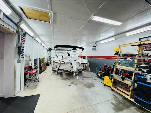 6522 Pimlico St, North Port, FL 34291 - garage featuring an AC wall unit