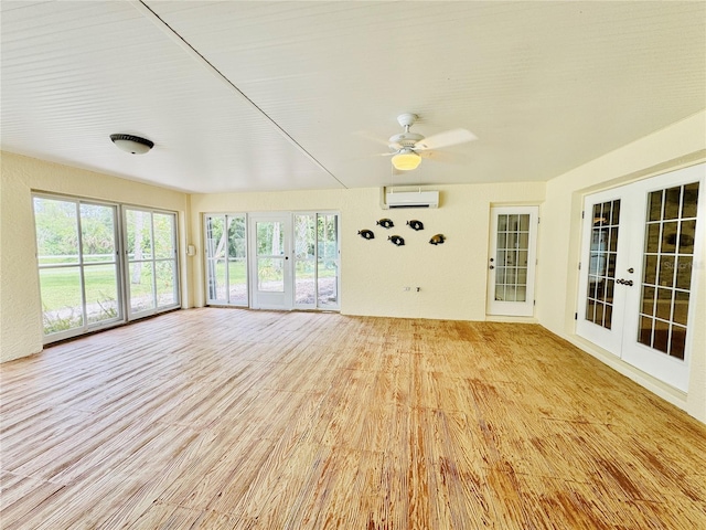 6522 Pimlico St, North Port, FL 34291 - unfurnished sunroom featuring french doors and a wall mounted AC