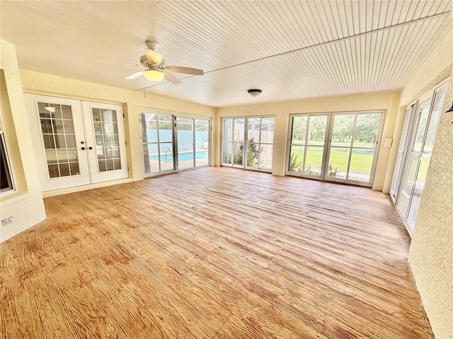 6522 Pimlico St, North Port, FL 34291 - unfurnished sunroom featuring french doors and healthy amount of natural light