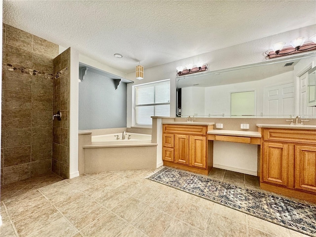6522 Pimlico St, North Port, FL 34291 - full bathroom featuring double vanity, a garden tub, a tile shower, a textured ceiling, and tile patterned floors