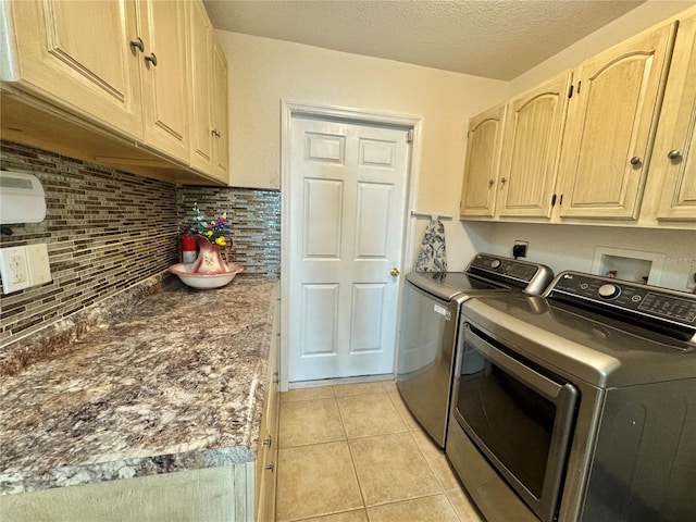 6522 Pimlico St, North Port, FL 34291 - laundry room with cabinet space, independent washer and dryer, and light tile patterned flooring
