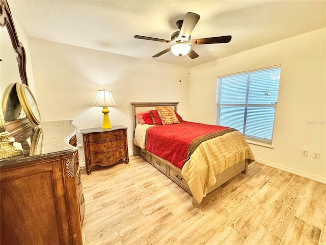 6522 Pimlico St, North Port, FL 34291 - bedroom with light wood-type flooring and a ceiling fan