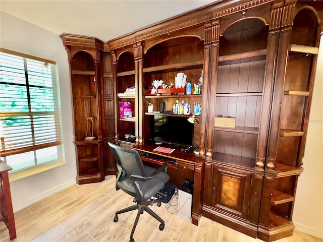 6522 Pimlico St, North Port, FL 34291 - home office with baseboards and wood finished floors