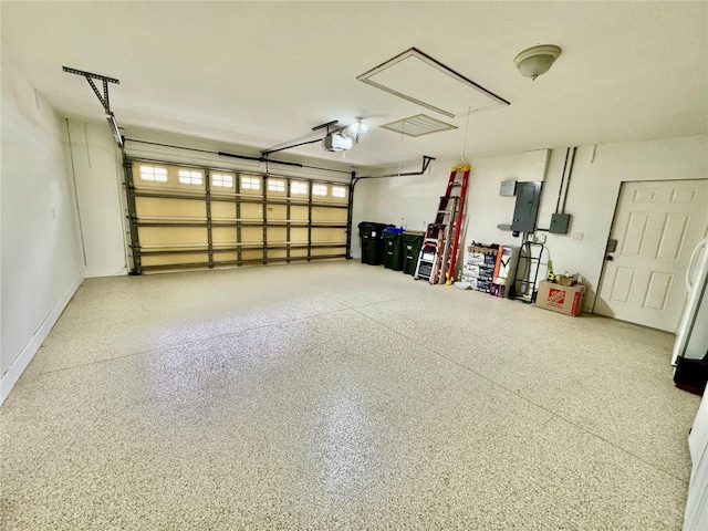 6522 Pimlico St, North Port, FL 34291 - garage with electric panel and a garage door opener