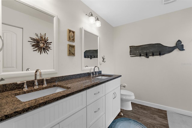 108 Albatross Rd, Rotonda West, FL 33947 - full bathroom with double vanity and wood finished floors