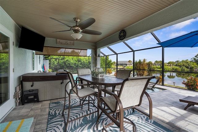108 Albatross Rd, Rotonda West, FL 33947 - sunroom / solarium featuring ceiling fan, a water view, and healthy amount of natural light