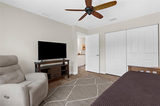 108 Albatross Rd, Rotonda West, FL 33947 - bedroom featuring wood finished floors, a closet, and a ceiling fan