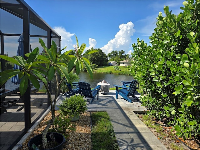 108 Albatross Rd, Rotonda West, FL 33947 - view of patio / terrace featuring a water view and a lanai