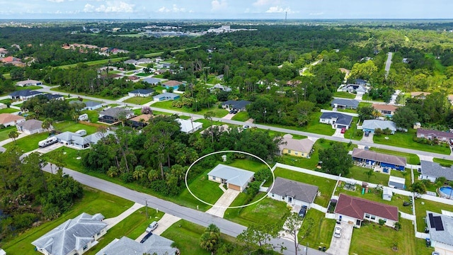 2403 Trianna St, North Port, FL 34291 - aerial view of property's location with nearby suburban area and a forest