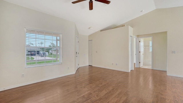 2403 Trianna St, North Port, FL 34291 - empty room featuring ceiling fan, vaulted ceiling, and wood finished floors