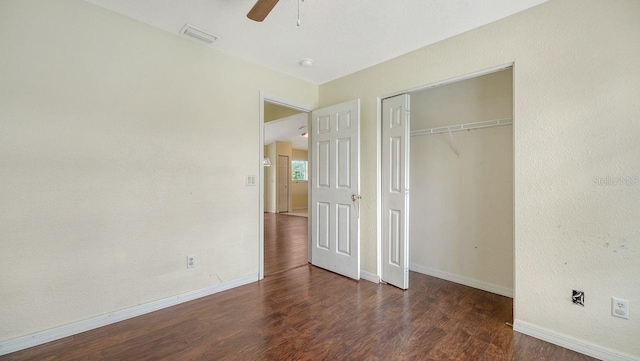 2403 Trianna St, North Port, FL 34291 - unfurnished bedroom with wood finished floors, ceiling fan, and a closet