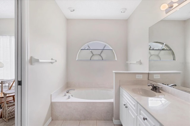 1429 Turnberry Dr, Venice, FL 34292 - bathroom with vanity, a garden tub, and tile patterned floors