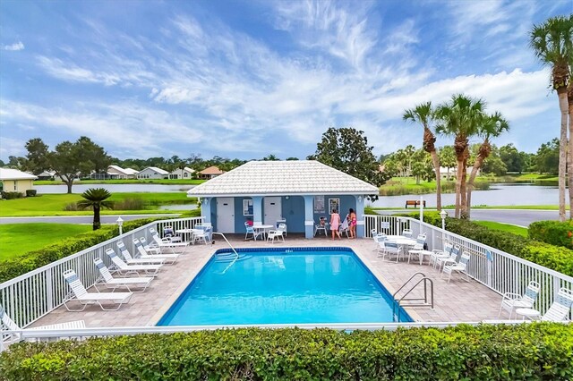 1429 Turnberry Dr, Venice, FL 34292 - community pool with a patio area and a water view
