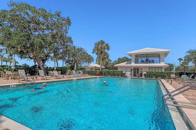1429 Turnberry Dr, Venice, FL 34292 - community pool featuring a patio