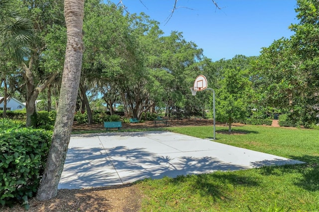 1429 Turnberry Dr, Venice, FL 34292 - view of basketball court with community basketball court and a lawn