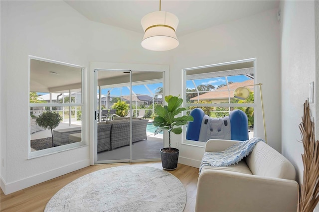 5028 Greenway Ct, North Port, FL 34287 - living area featuring wood finished floors and baseboards
