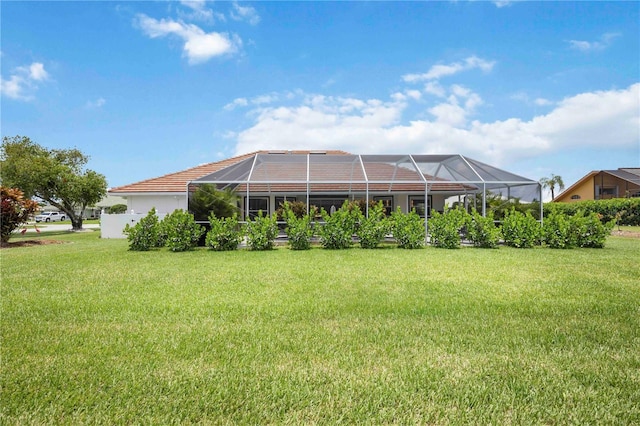 5028 Greenway Ct, North Port, FL 34287 - rear view of house with a yard and a lanai
