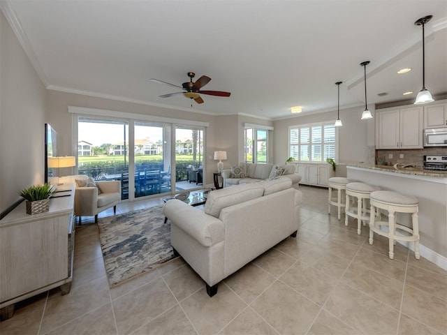 141 Bella Vista Ter Unit 34B, North Venice, FL 34275 - living area with ceiling fan, crown molding, light tile patterned floors, and recessed lighting