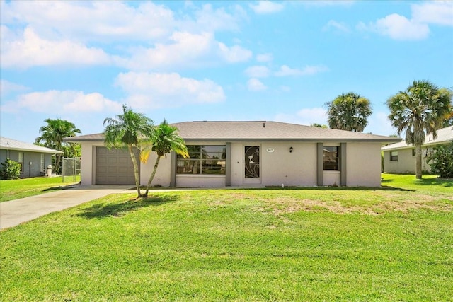 18671 Macgill Ave, Port Charlotte, FL 33948 - ranch-style home featuring driveway, an attached garage, stucco siding, and a front lawn