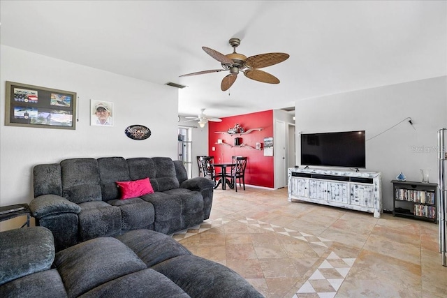 18671 Macgill Ave, Port Charlotte, FL 33948 - living area with ceiling fan and light tile patterned floors