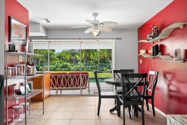 18671 Macgill Ave, Port Charlotte, FL 33948 - dining area featuring plenty of natural light, a ceiling fan, and light tile patterned floors