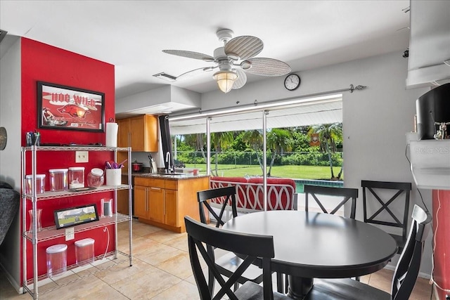 18671 Macgill Ave, Port Charlotte, FL 33948 - dining room featuring ceiling fan and light tile patterned flooring