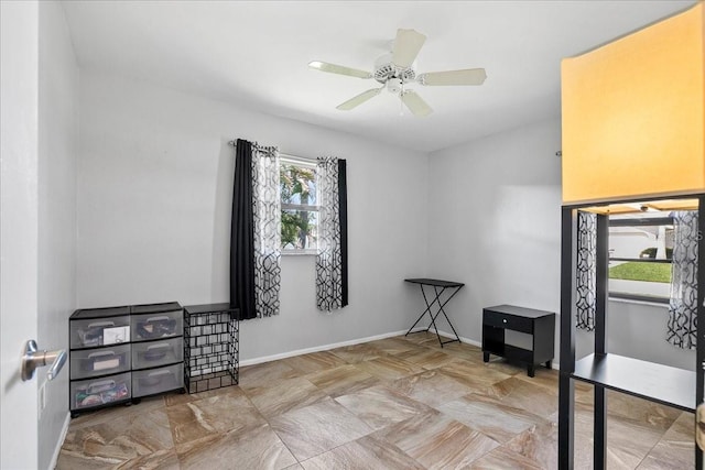 18671 Macgill Ave, Port Charlotte, FL 33948 - misc room featuring ceiling fan and baseboards