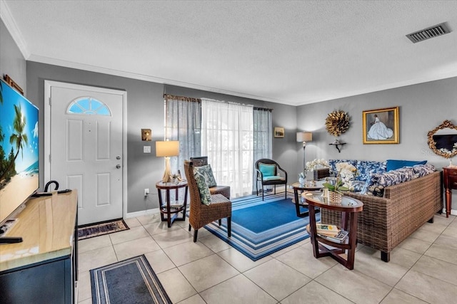 8651 Ellesmere Ct, North Port, FL 34287 - living area featuring healthy amount of natural light, ornamental molding, a textured ceiling, and light tile patterned floors
