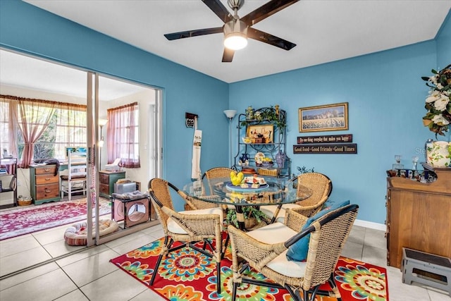 8651 Ellesmere Ct, North Port, FL 34287 - dining space with ceiling fan and tile patterned flooring