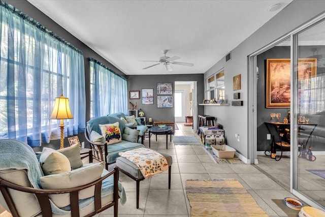 8651 Ellesmere Ct, North Port, FL 34287 - living area featuring a ceiling fan and light tile patterned flooring