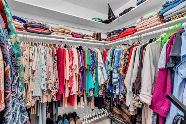8651 Ellesmere Ct, North Port, FL 34287 - walk in closet with tile patterned floors