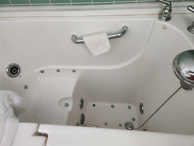 8651 Ellesmere Ct, North Port, FL 34287 - full bathroom with a tub with jets