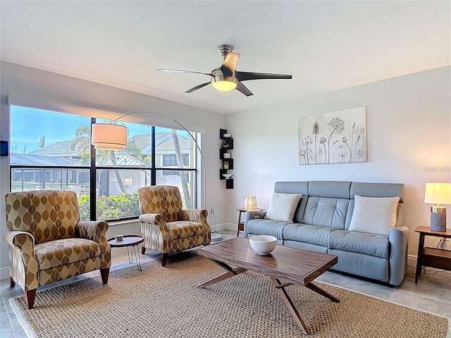 1335 Rock Dove Ct Unit 111, Punta Gorda, FL 33950 - living room featuring ceiling fan and baseboards