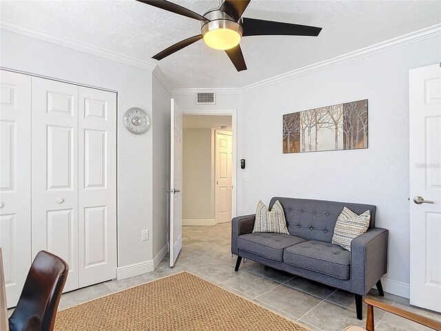 1335 Rock Dove Ct Unit 111, Punta Gorda, FL 33950 - living room with ornamental molding, a ceiling fan, and light tile patterned floors