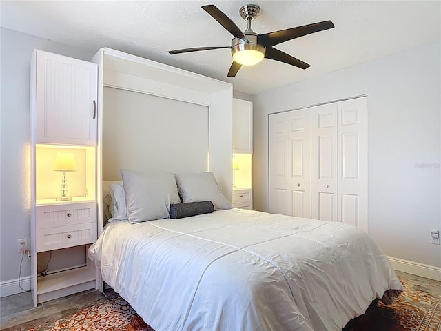 1335 Rock Dove Ct Unit 111, Punta Gorda, FL 33950 - bedroom featuring a closet, a ceiling fan, and wood finished floors