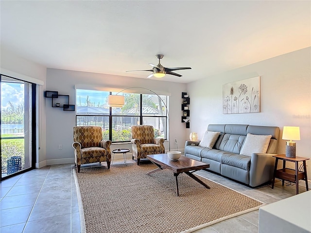 1335 Rock Dove Ct Unit 111, Punta Gorda, FL 33950 - living room with light tile patterned floors and ceiling fan