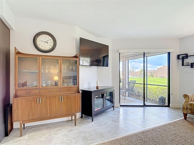 1335 Rock Dove Ct Unit 111, Punta Gorda, FL 33950 - dining area with baseboards and light tile patterned floors