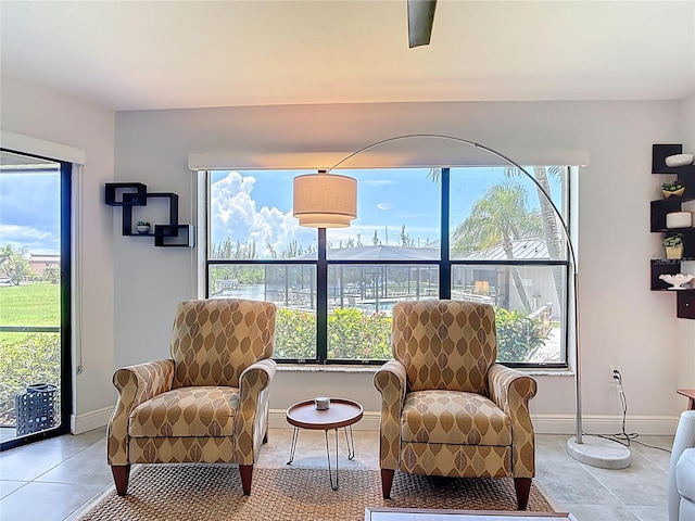 1335 Rock Dove Ct Unit 111, Punta Gorda, FL 33950 - sitting room featuring light tile patterned flooring and plenty of natural light