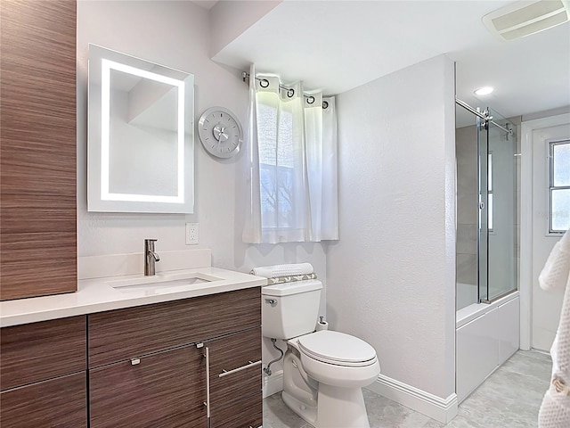 1335 Rock Dove Ct Unit 111, Punta Gorda, FL 33950 - bathroom with vanity and bath / shower combo with glass door
