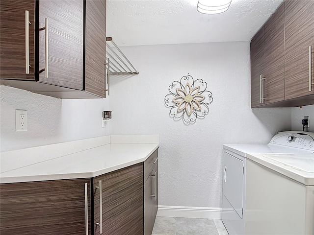 1335 Rock Dove Ct Unit 111, Punta Gorda, FL 33950 - laundry room with cabinet space and washer and clothes dryer