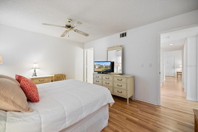 752 White Pine Tree Rd Unit 108, Venice, FL 34285 - bedroom featuring light wood-style flooring and ceiling fan