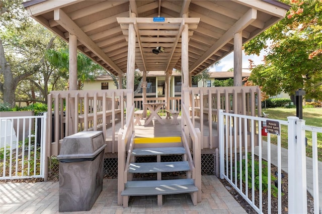 752 White Pine Tree Rd Unit 108, Venice, FL 34285 - wooden terrace with area for grilling