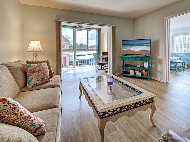 200 The Esplanade N Unit B19, Venice, FL 34285 - living room featuring wood finished floors