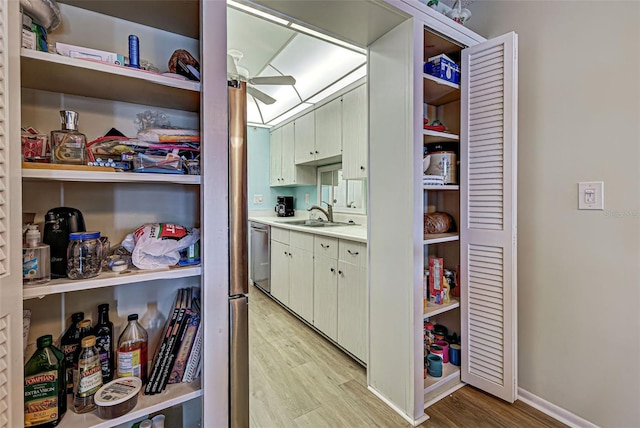 200 The Esplanade N Unit B19, Venice, FL 34285 - storage area featuring a sink