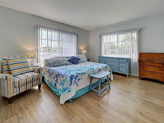 200 The Esplanade N Unit B19, Venice, FL 34285 - bedroom featuring light wood-style floors